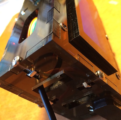 A laser-cut acrylic enclosure held together by notched edges